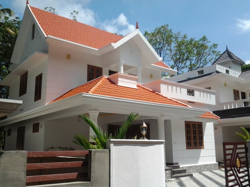 medium budget home design in karukutty 1700 Sq. Ft.