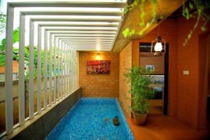 1630 square feet nature home design in kollam