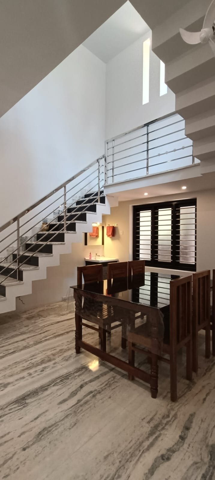 a dining space near stair case