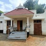 1004 sqft compact house at Kerala