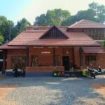 Traditional Slope Roof House at Ernakulam