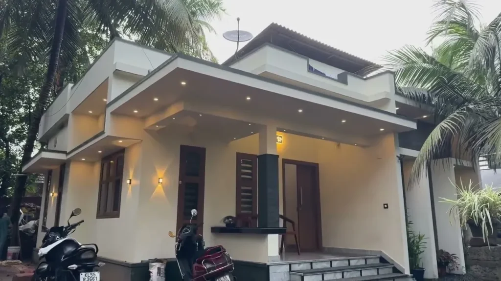 Exterior view of a compact 10 lakh budget home designed by Budget Homes. For instance, it features elegant marble flooring, a modern GS staircase, and spacious interiors with large windows for ample natural light. Thus, it’s ideal for small families seeking affordable, stylish living spaces.